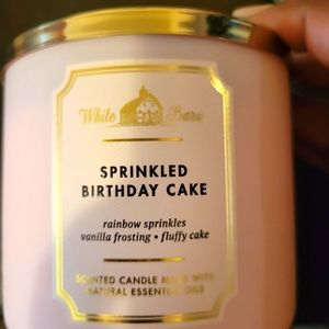 Sprinkled birthday cake candle